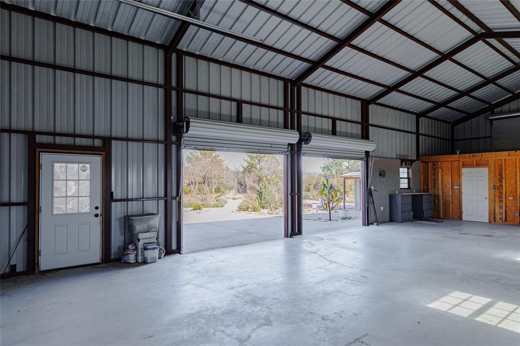 1433 County Road 1180 Decatur, TX 76234 - Photo 25 of 36 a view of an empty room with a balcony