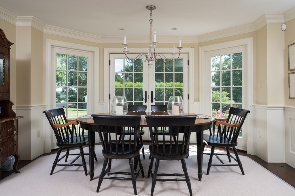 26 Talbot Road Hingham, MA 02043 - Photo 12 of 40 a dining room with furniture a chandelier and wooden floor