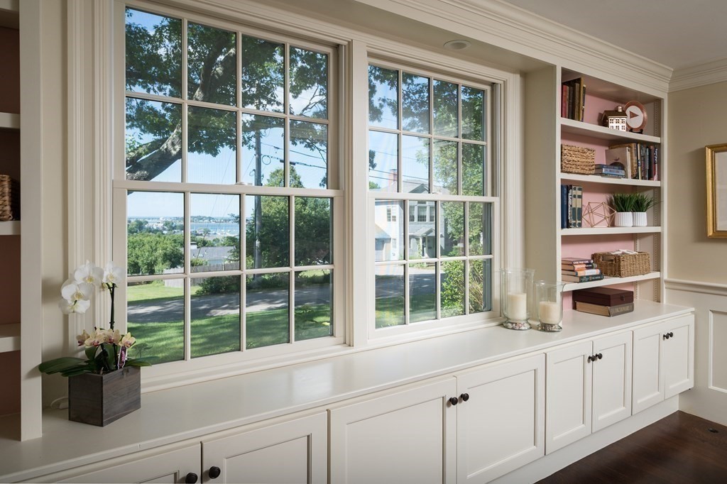 26 Talbot Road Hingham, MA 02043 - Photo 13 of 40 a kitchen with a large window and a potted plant