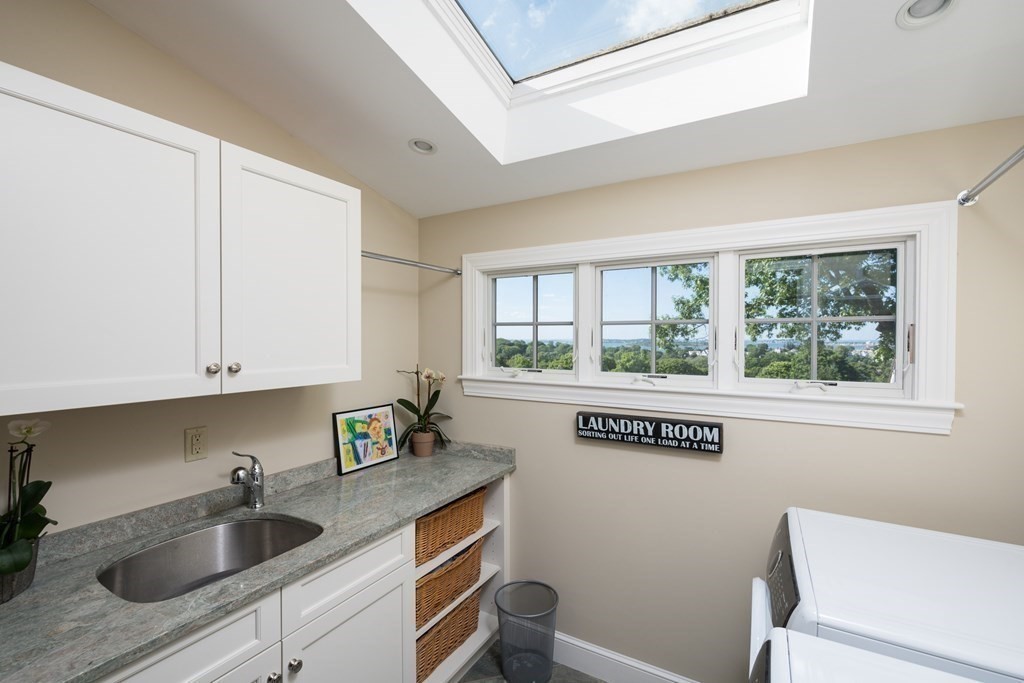 26 Talbot Road Hingham, MA 02043 - Photo 20 of 40 a kitchen with a sink cabinets and window