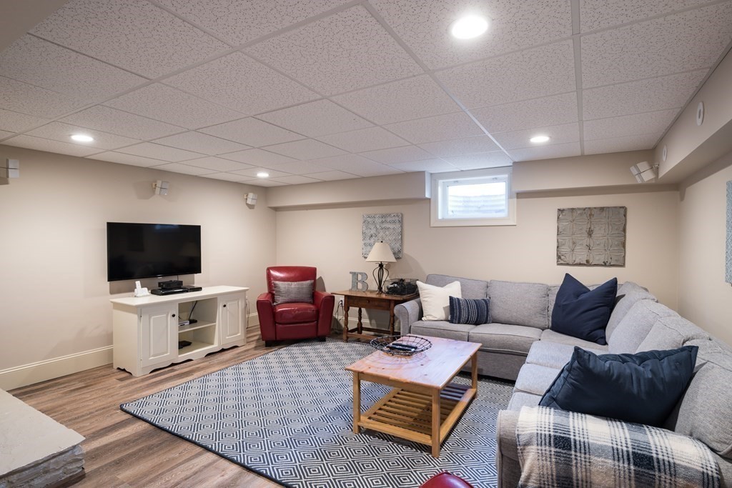 26 Talbot Road Hingham, MA 02043 - Photo 23 of 40 a living room with furniture and a flat screen tv