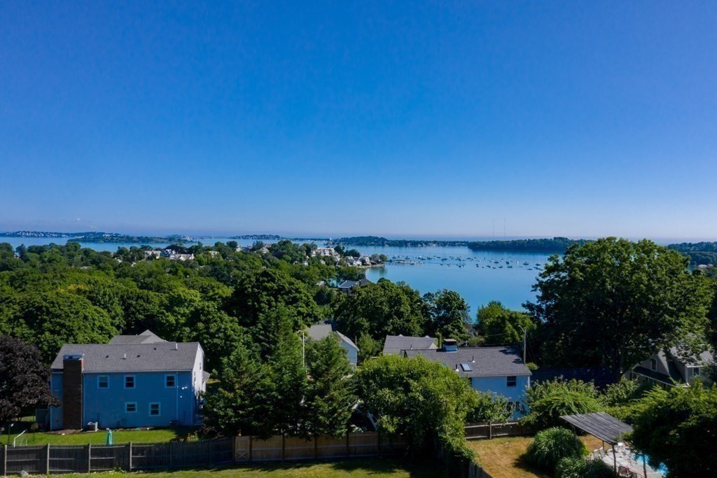 26 Talbot Road Hingham, MA 02043 - Photo 30 of 40 an aerial view of a residential apartment building with a yard