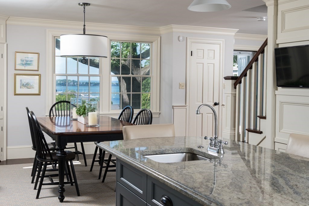 26 Talbot Road Hingham, MA 02043 - Photo 3 of 40 a dining room with furniture a chandelier and window
