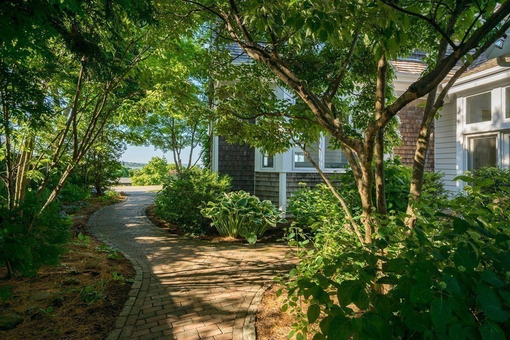 26 Talbot Road Hingham, MA 02043 - Photo 31 of 40 a view of a yard with plants and large trees