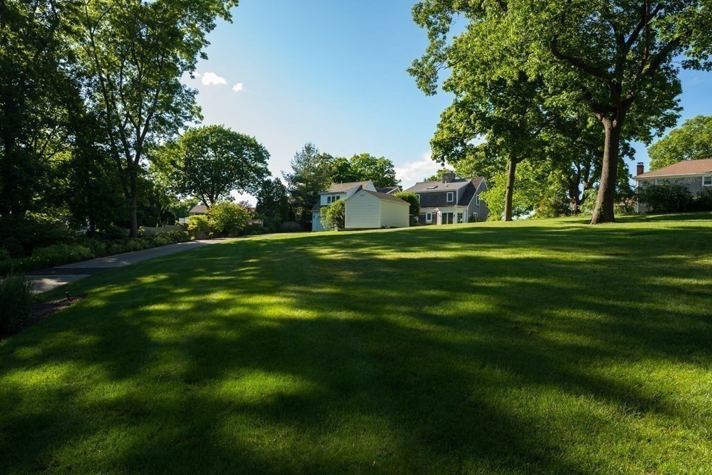 26 Talbot Road Hingham, MA 02043 - Photo 33 of 40 a front view of a house with a yard