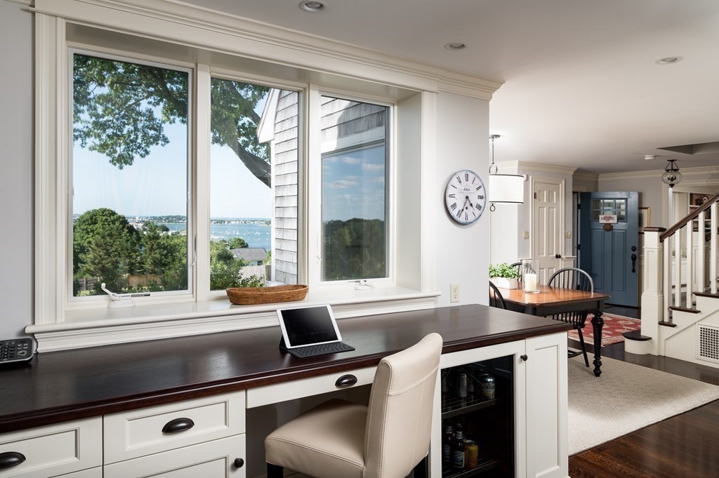 26 Talbot Road Hingham, MA 02043 - Photo 8 of 40 a view of a room that has a couch and a table in it