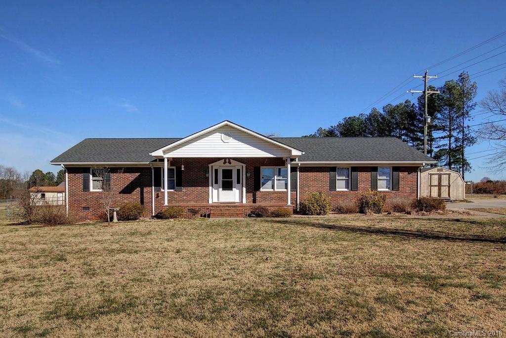 2095 Sides Road Salisbury, NC 28146 - Photo 1 of 25 a front view of a house with a yard