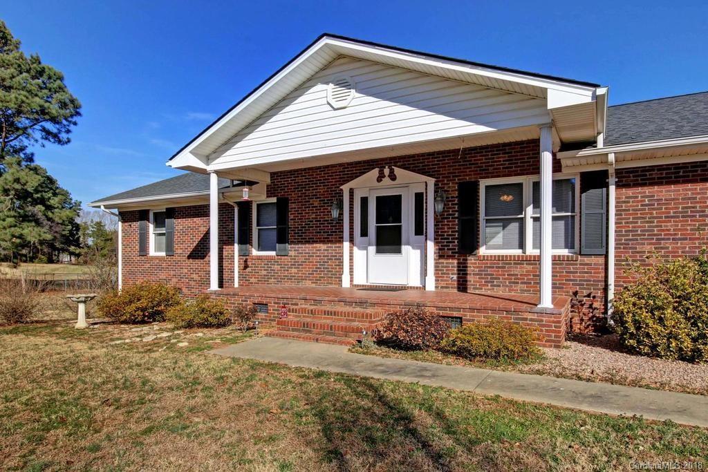 2095 Sides Road Salisbury, NC 28146 - Photo 2 of 25 a front view of a house with a yard