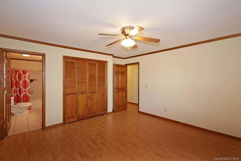 2095 Sides Road Salisbury, NC 28146 - Photo 16 of 25 an empty room with closet and window