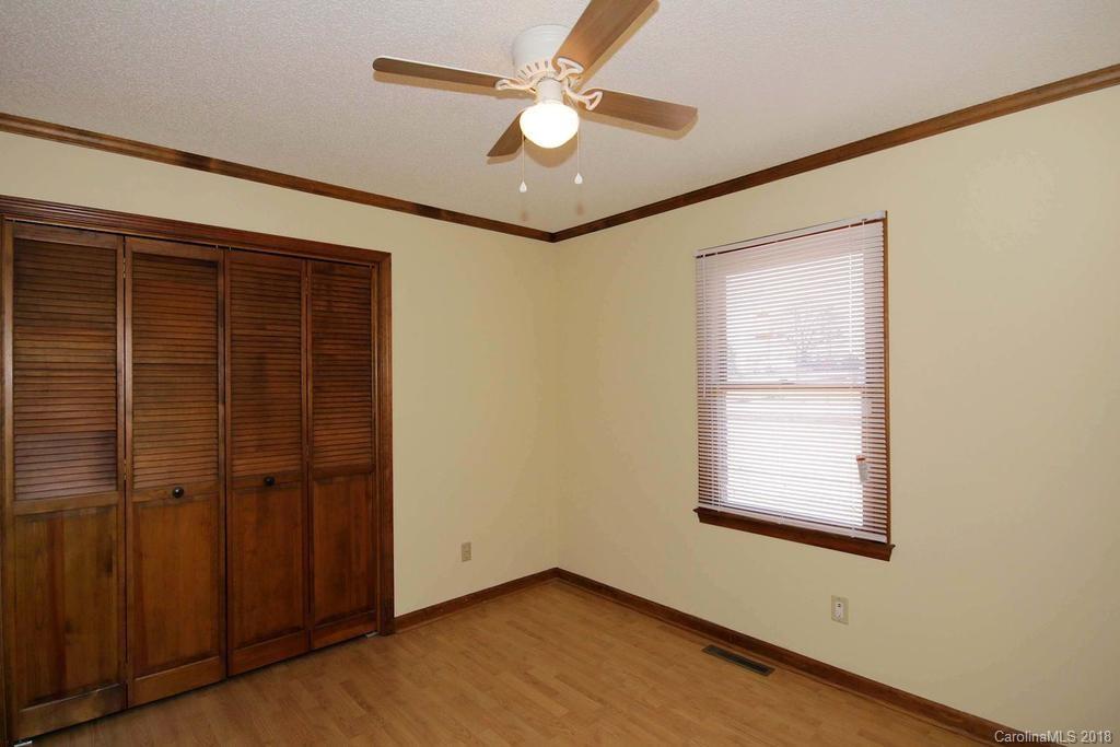 2095 Sides Road Salisbury, NC 28146 - Photo 18 of 25 an empty room with windows and fan