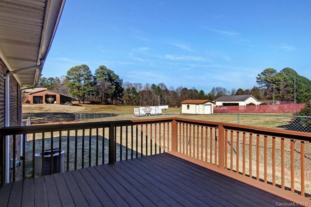 2095 Sides Road Salisbury, NC 28146 - Photo 22 of 25 a view of a balcony with wooden floor