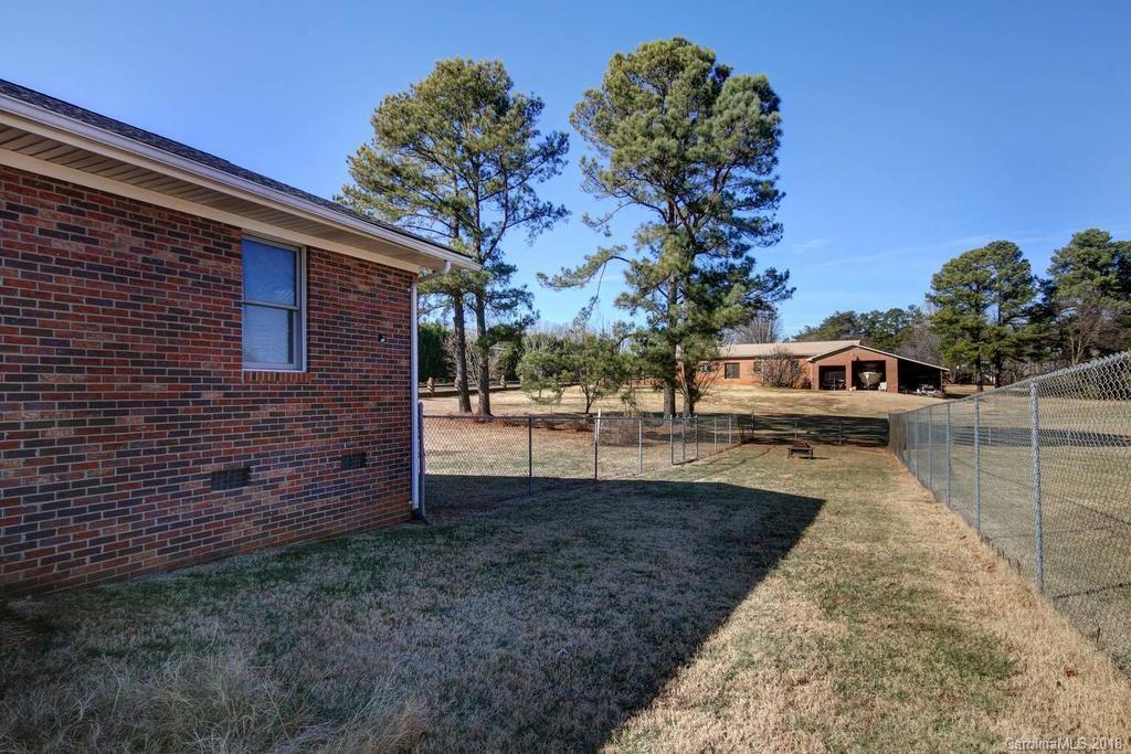 2095 Sides Road Salisbury, NC 28146 - Photo 23 of 25 a view of a back yard of the house