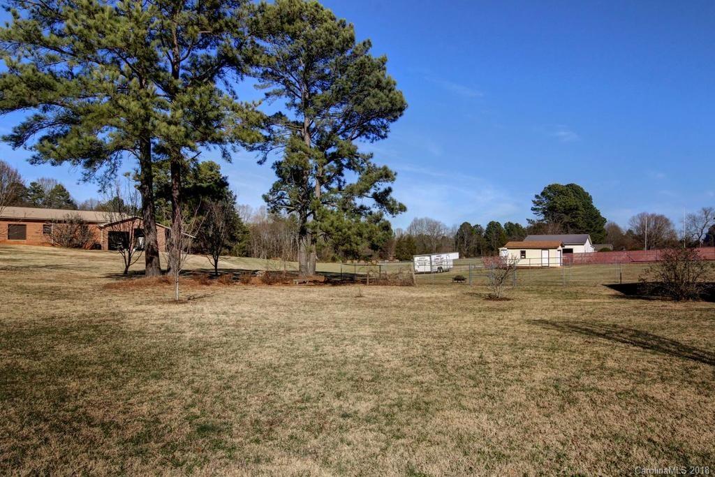 2095 Sides Road Salisbury, NC 28146 - Photo 24 of 25 a view of a yard with a tree