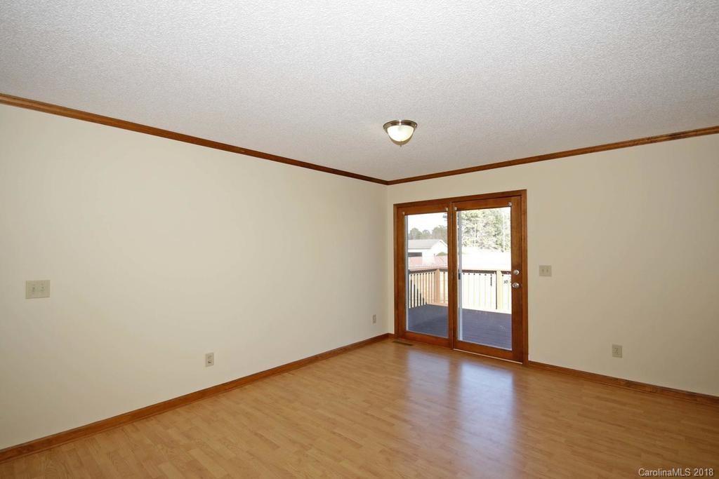2095 Sides Road Salisbury, NC 28146 - Photo 8 of 25 wooden floor in an empty room with a window