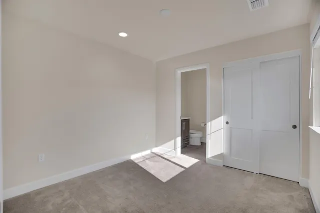 an empty room with an entryway