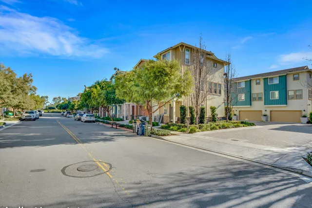 a view of a street with a building in the background