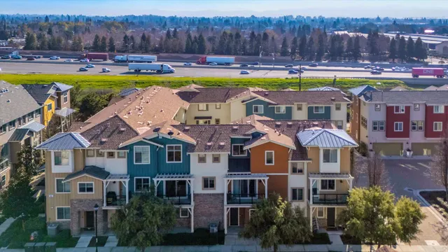 a view of a swimming pool with outdoor seating and yard