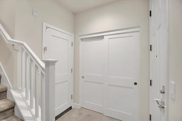 a view of a livingroom with stairs