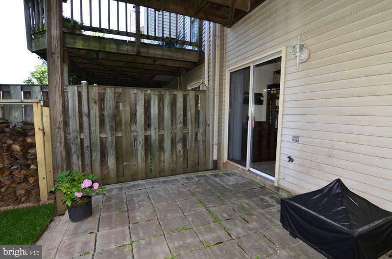 46856 Rabbitrun Terrace Sterling, VA 20164 - Photo 28 of 30 Rear patio off walk out recreation room