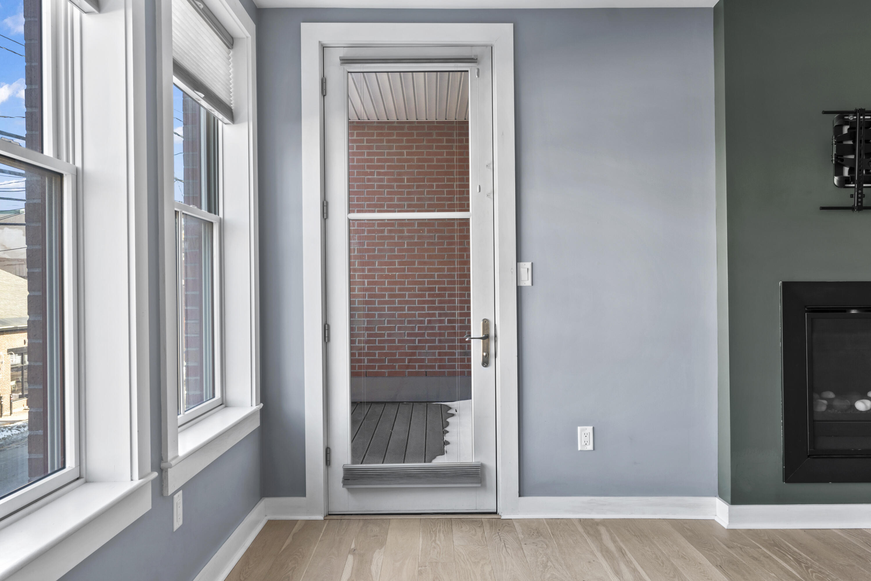 62 India Street, Unit 203 Portland, ME 04101 - Photo 22 of 70 Door to balcony