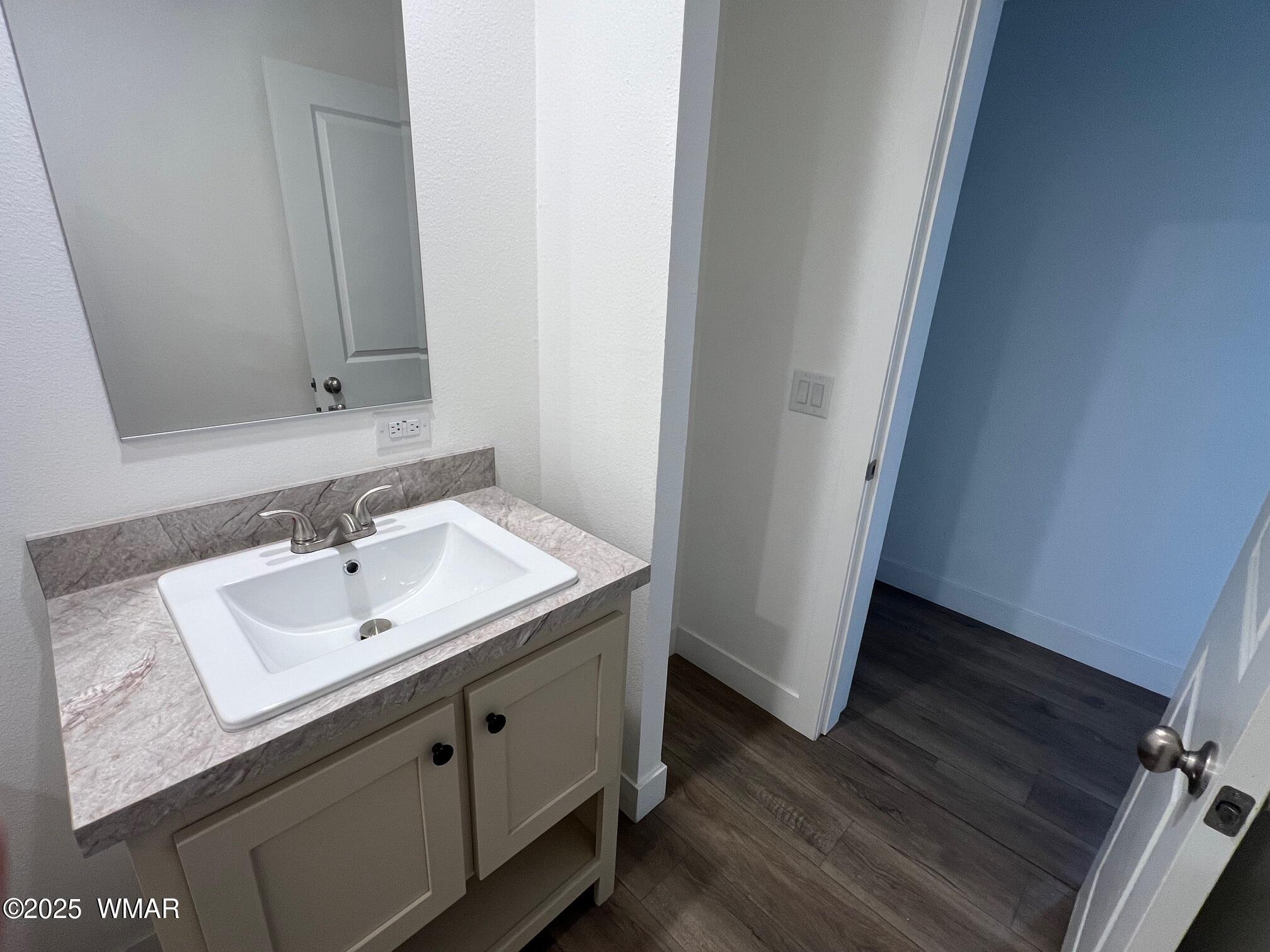 4129 Apache Road Snowflake, AZ 85937 - Photo 19 of 48 a bathroom with a sink and a mirror