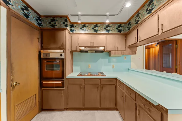 a utility room with washer and dryer