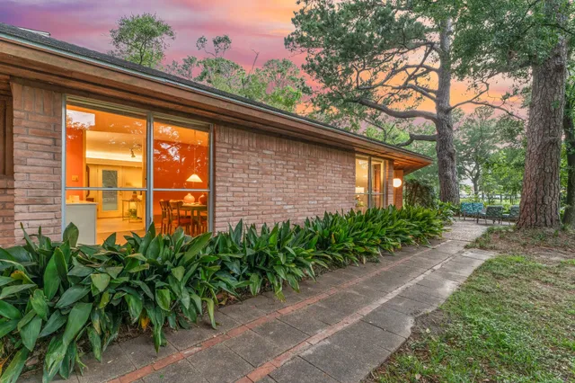 a backyard of a house with lots of green space