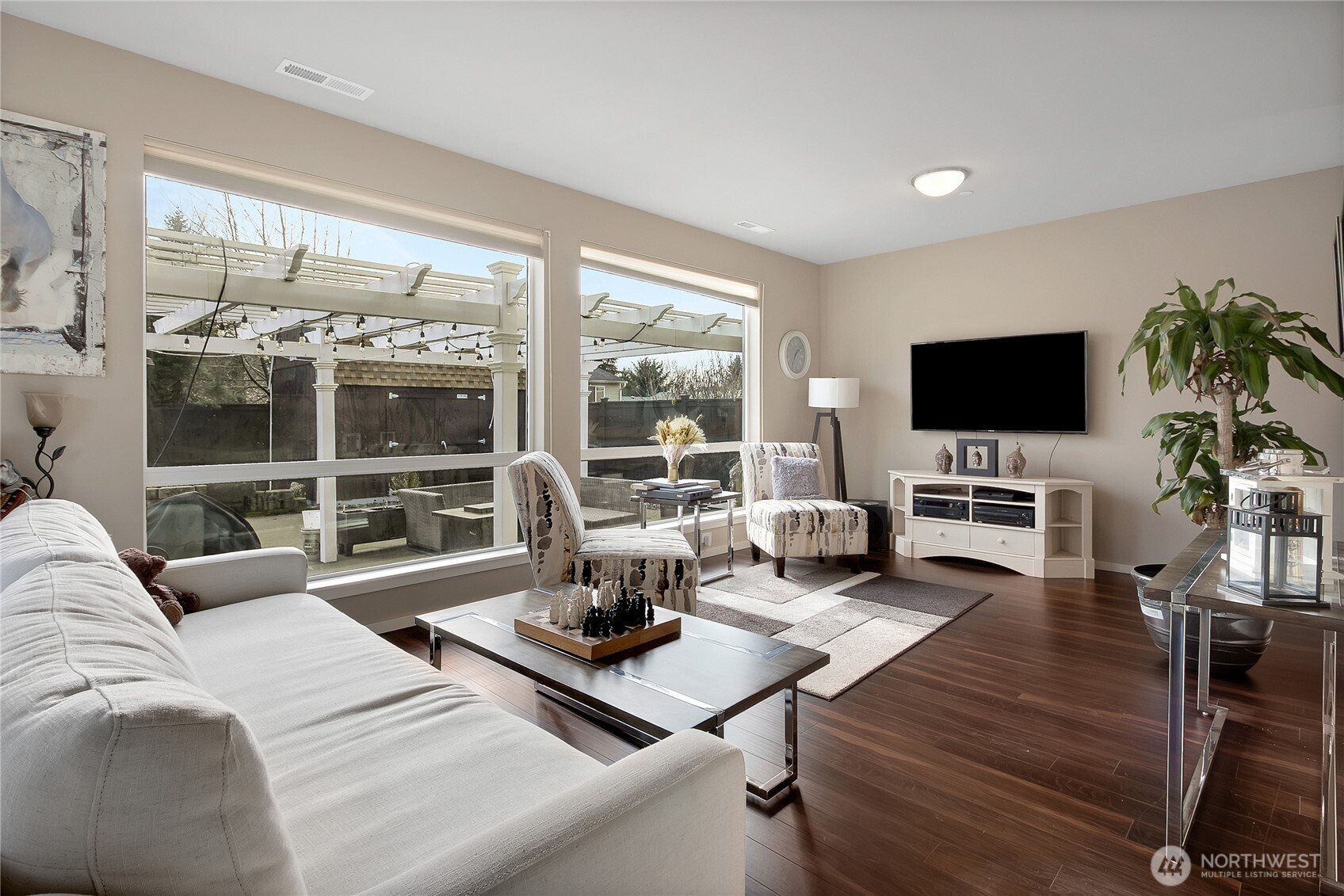 31524 11th Place Southwest Federal Way, WA 98023 - Photo 14 of 40 a living room with furniture a flat screen tv and floor to ceiling window
