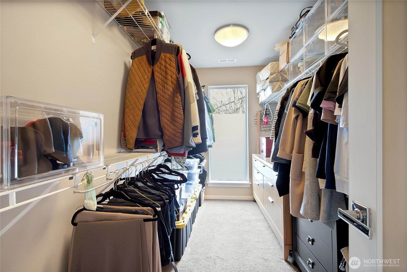 31524 11th Place Southwest Federal Way, WA 98023 - Photo 19 of 40 a view of walk in closet with clothes and shoes