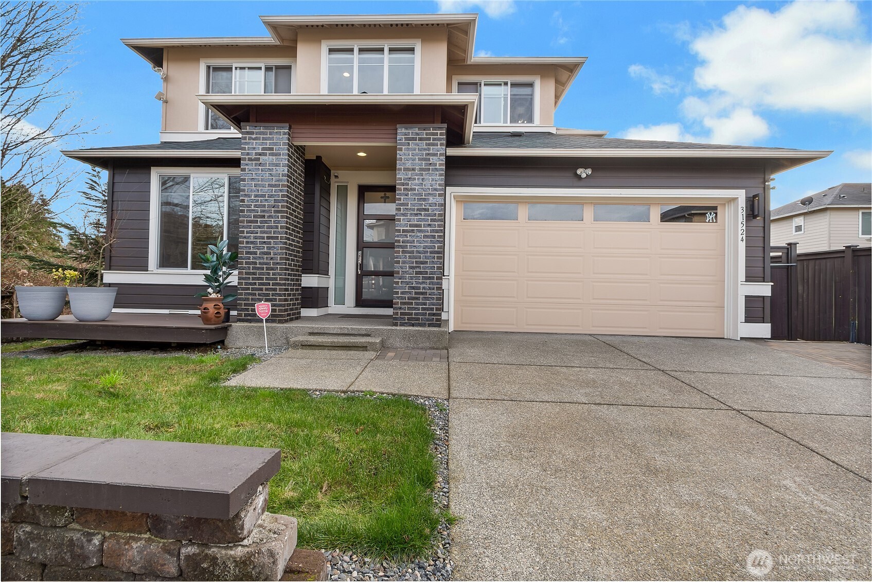31524 11th Place Southwest Federal Way, WA 98023 - Photo 2 of 40 a view of a house with a yard