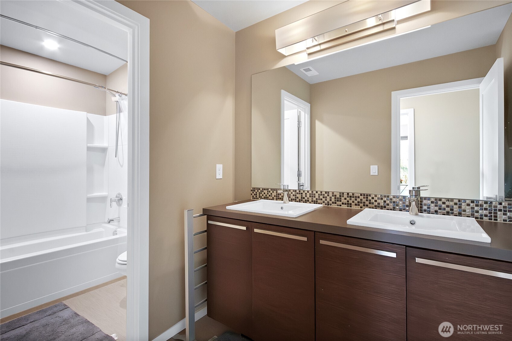 31524 11th Place Southwest Federal Way, WA 98023 - Photo 23 of 40 a bathroom with a granite countertop sink and a mirror