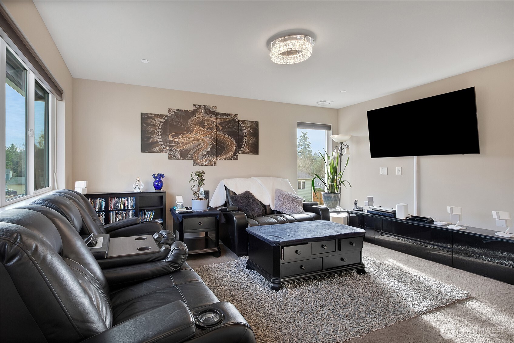 31524 11th Place Southwest Federal Way, WA 98023 - Photo 26 of 40 a living room with furniture and a flat screen tv