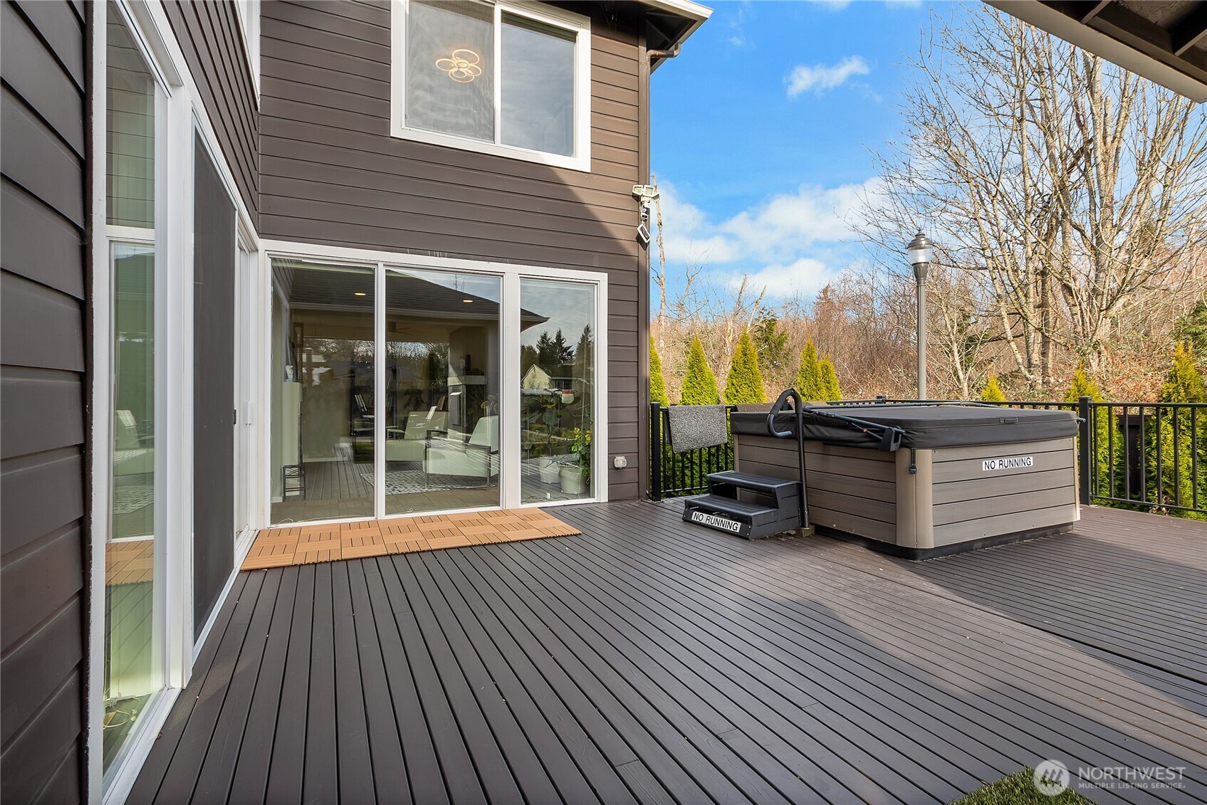 31524 11th Place Southwest Federal Way, WA 98023 - Photo 29 of 40 a blue bench sitting in front of a house