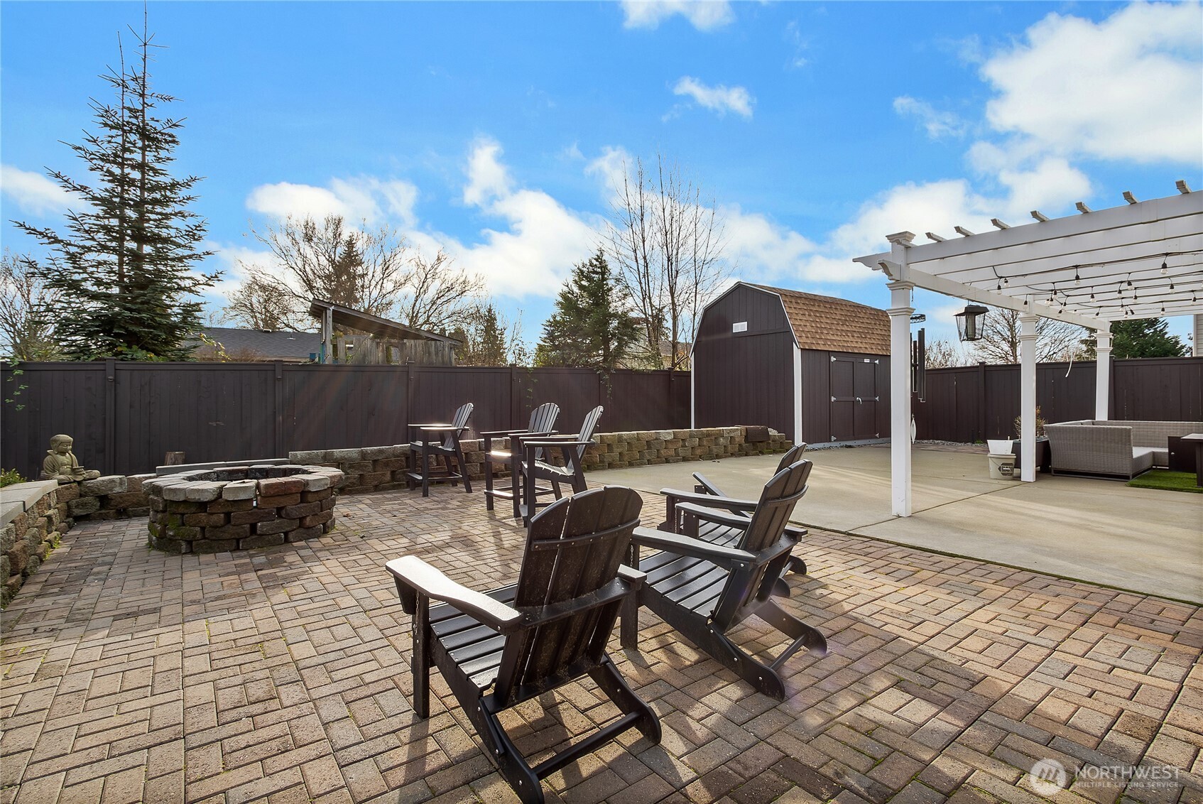 31524 11th Place Southwest Federal Way, WA 98023 - Photo 33 of 40 a view of a patio with a table and chairs