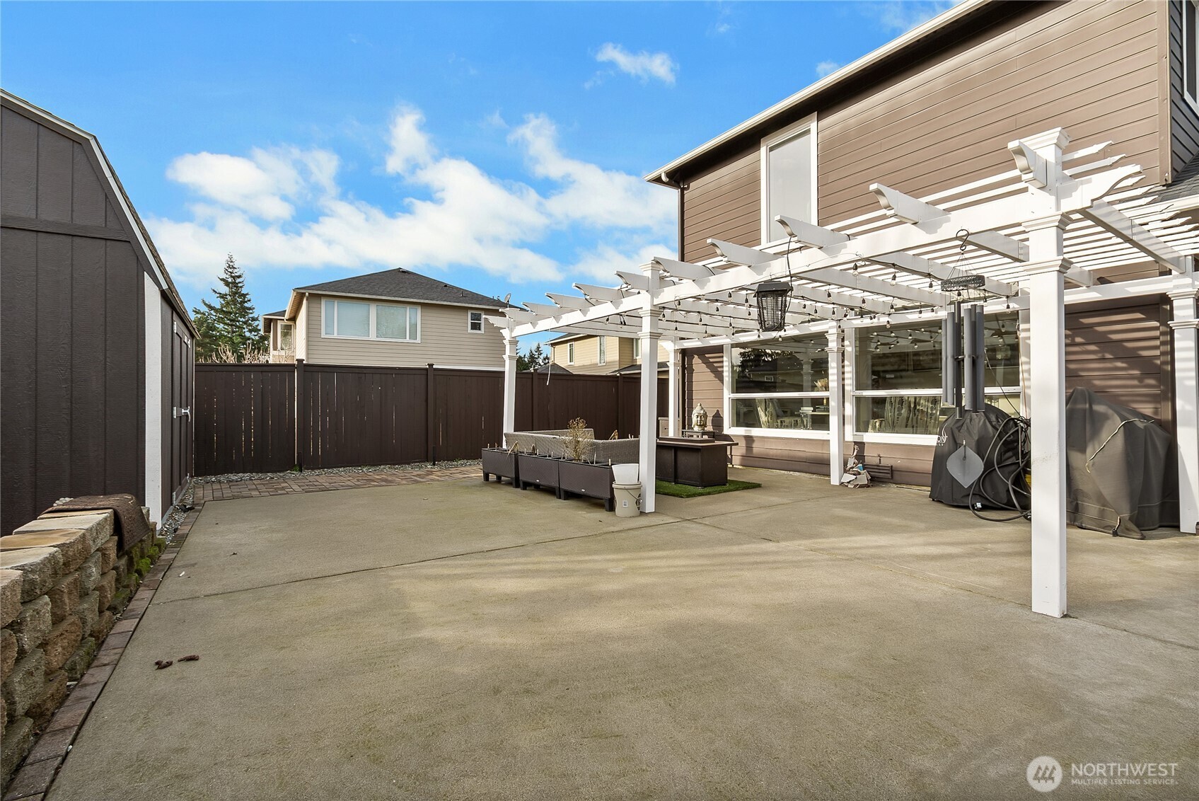 31524 11th Place Southwest Federal Way, WA 98023 - Photo 37 of 40 a view of a house with a patio and balcony