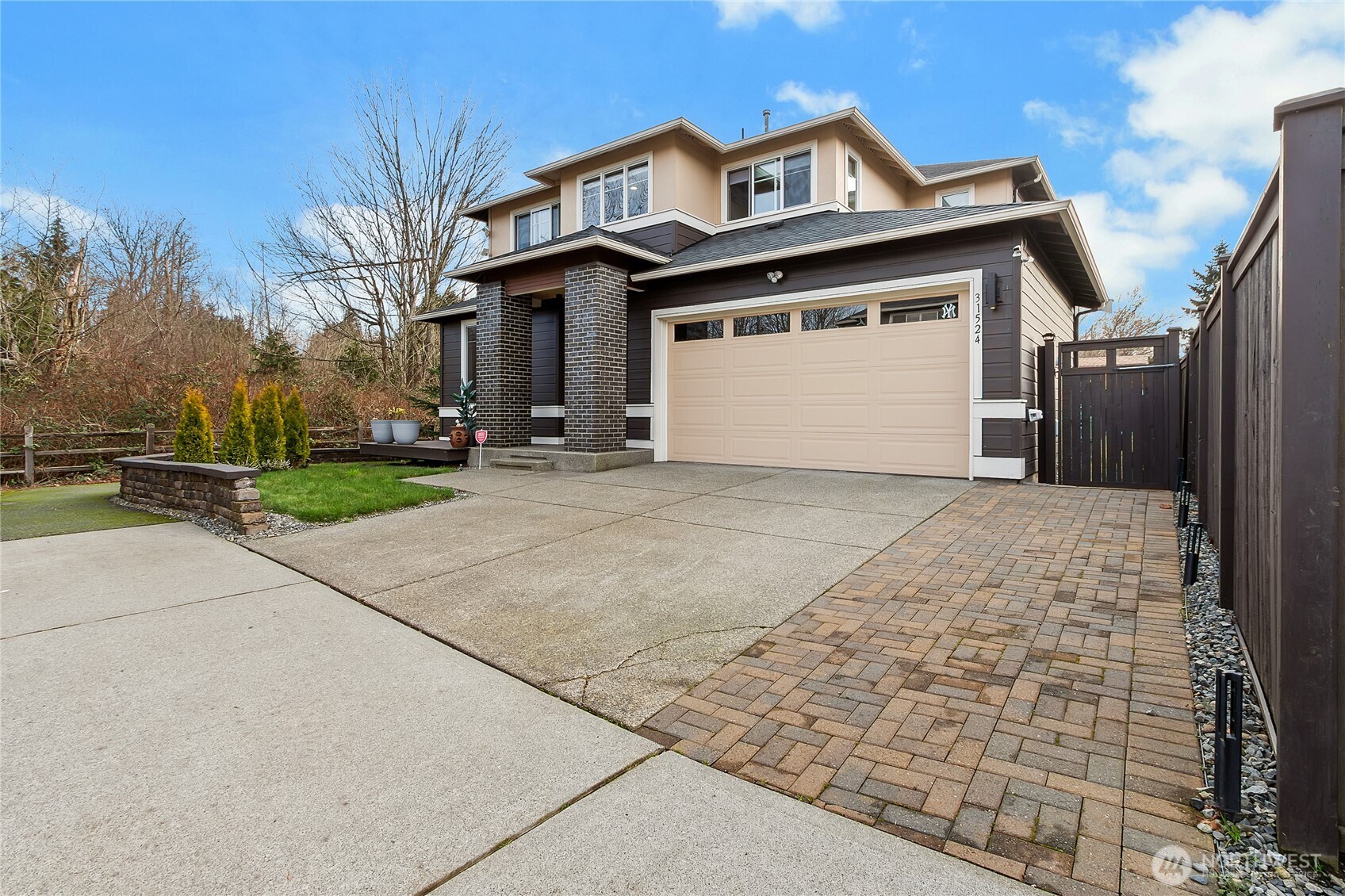 31524 11th Place Southwest Federal Way, WA 98023 - Photo 40 of 40 a front view of a house with a garden and garage
