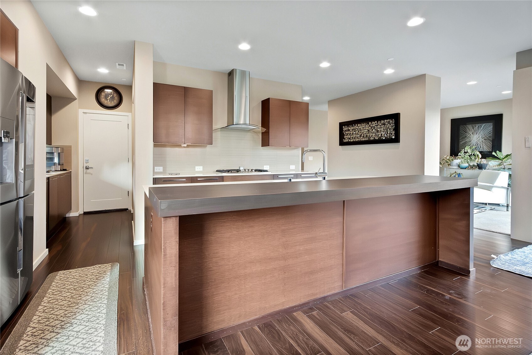 31524 11th Place Southwest Federal Way, WA 98023 - Photo 8 of 40 a kitchen with stainless steel appliances granite countertop a sink and a refrigerator