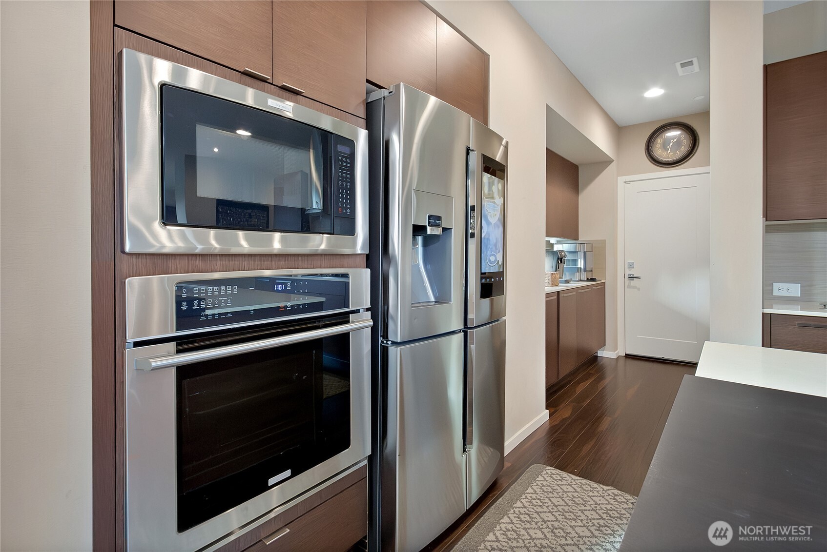 31524 11th Place Southwest Federal Way, WA 98023 - Photo 9 of 40 a kitchen with stainless steel appliances a refrigerator stove and microwave