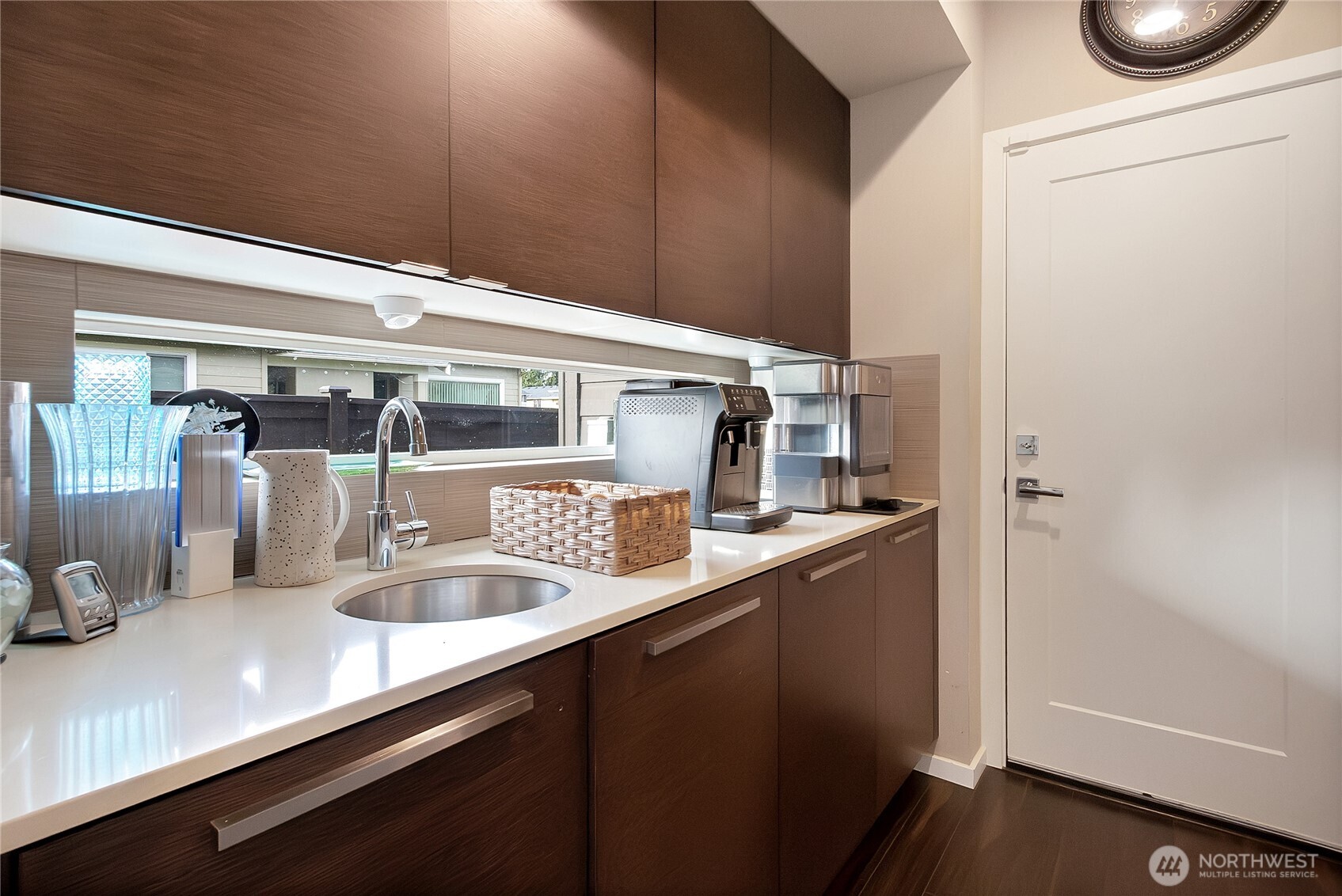 31524 11th Place Southwest Federal Way, WA 98023 - Photo 10 of 40 a kitchen with a sink and wooden floor