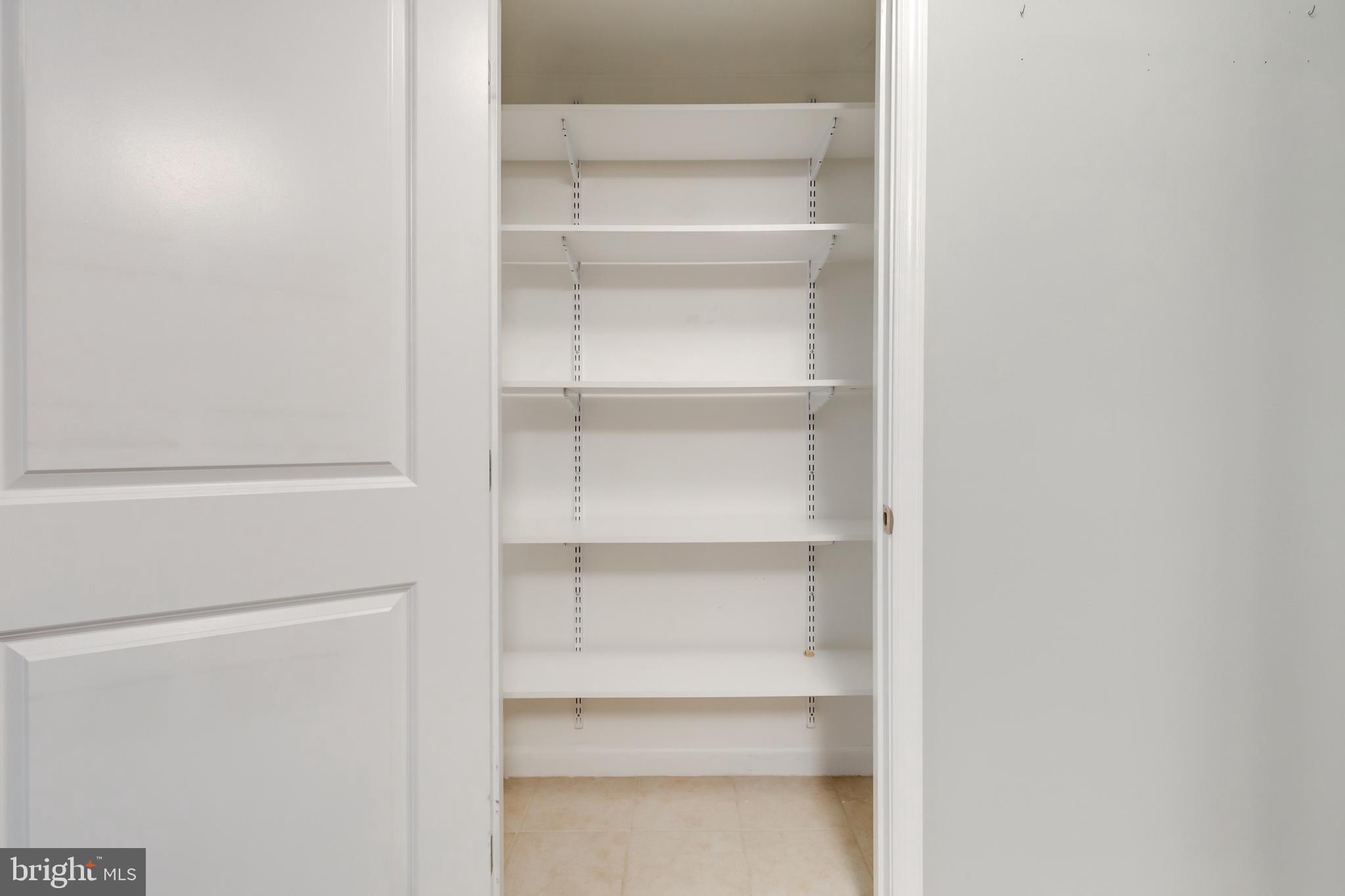 851 North Glebe Road, Unit 1020 Arlington, VA 22203 - Photo 10 of 52 Cupboard next to Kitchen