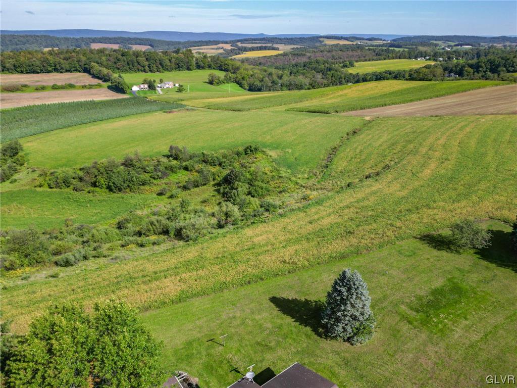 9191 Red Road Kempton, PA 19529 - Photo 6 of 11 a view of a field with an ocean