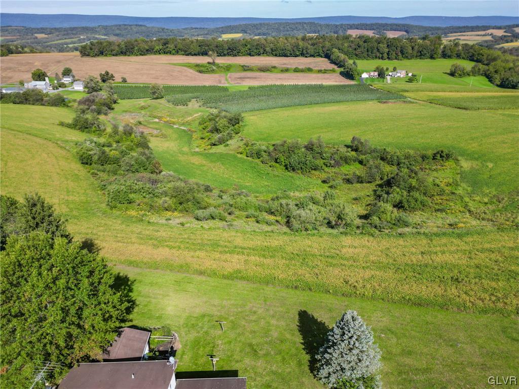 9191 Red Road Kempton, PA 19529 - Photo 7 of 11 a view of a field with an ocean