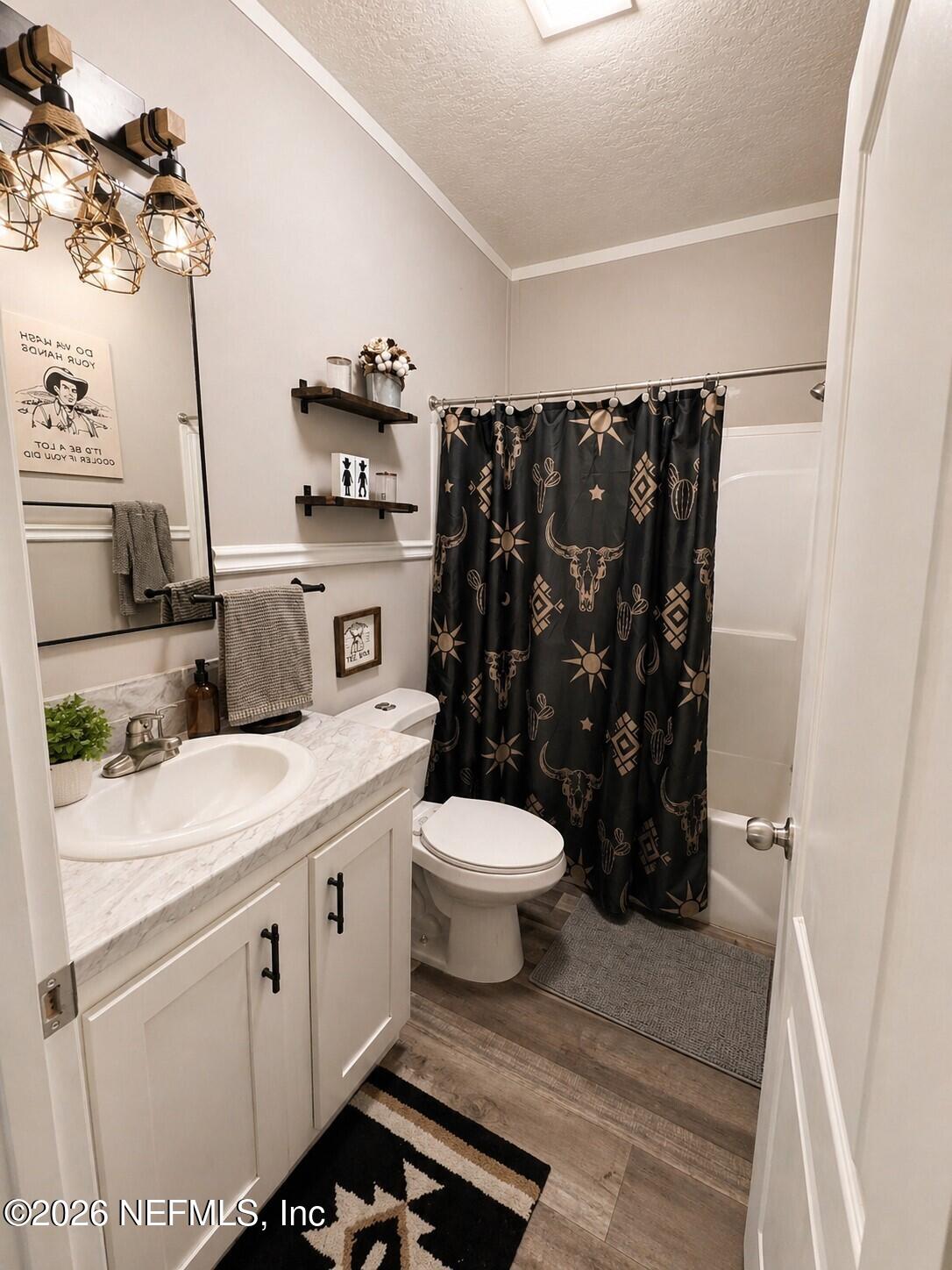 124 Jack Road Palatka, FL 32177 - Photo 12 of 18 a bathroom with a sink a toilet and shower