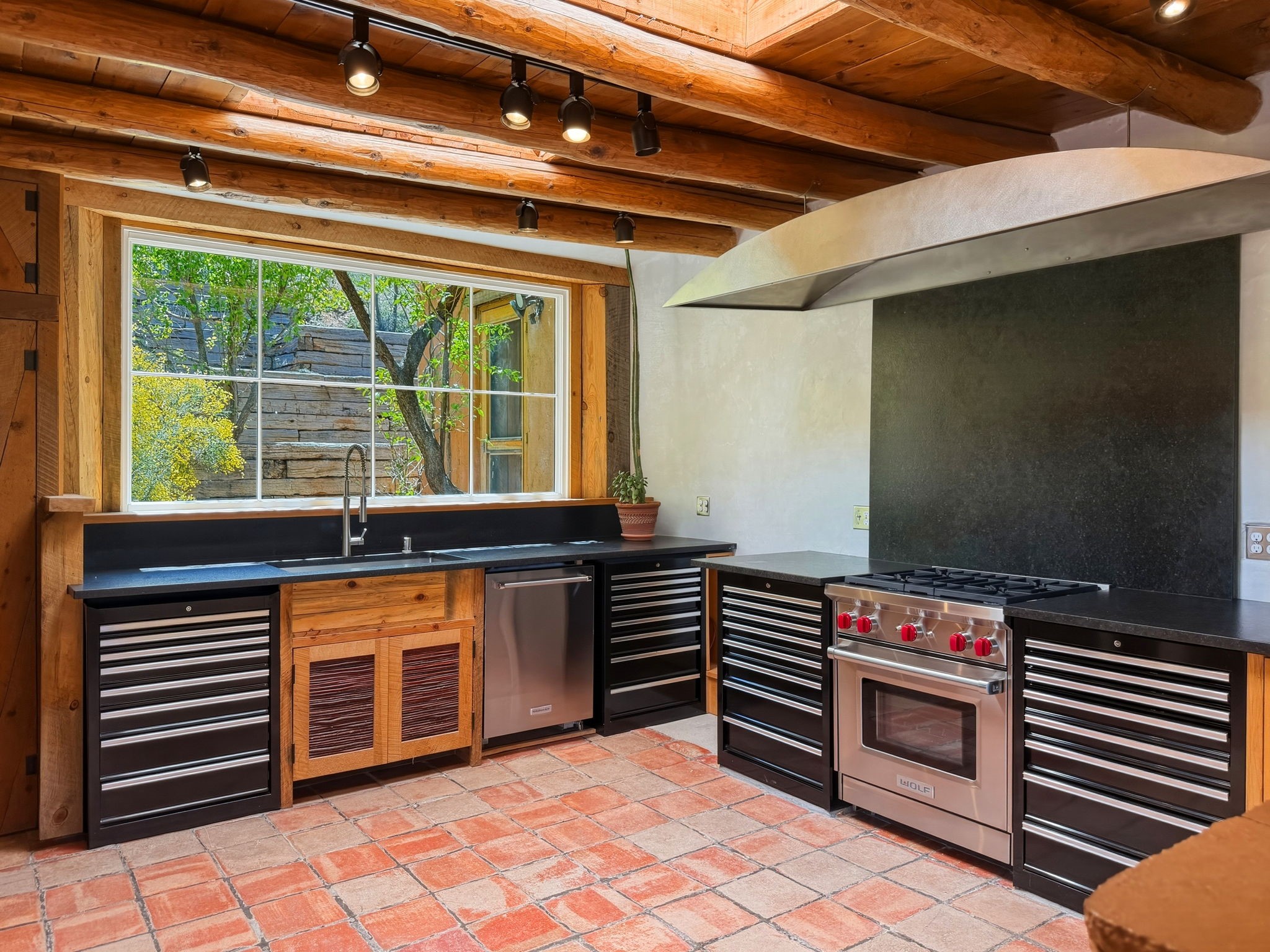 1692 Upper Canyon Road Santa Fe, NM 87501 - Photo 4 of 52 Eclectic Southwestern kitchen with artisan character.