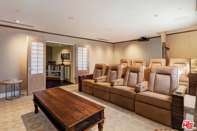 a bathroom with a double vanity sink a mirror and a bathtub