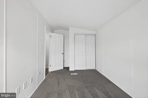 a view of a livingroom with wooden floor