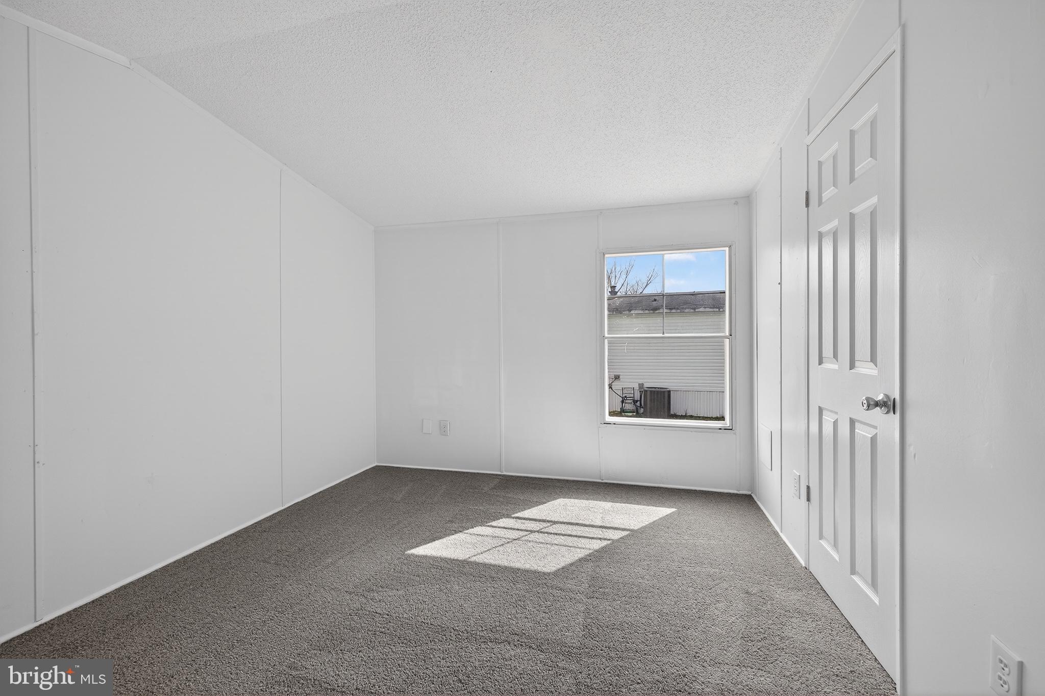 126 Boxwood Road, Unit 126 Middletown, DE 19709 - Photo 16 of 33 Bright and airy blank canvas room.