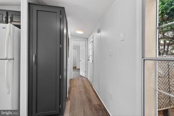 a view of small space with wooden floor