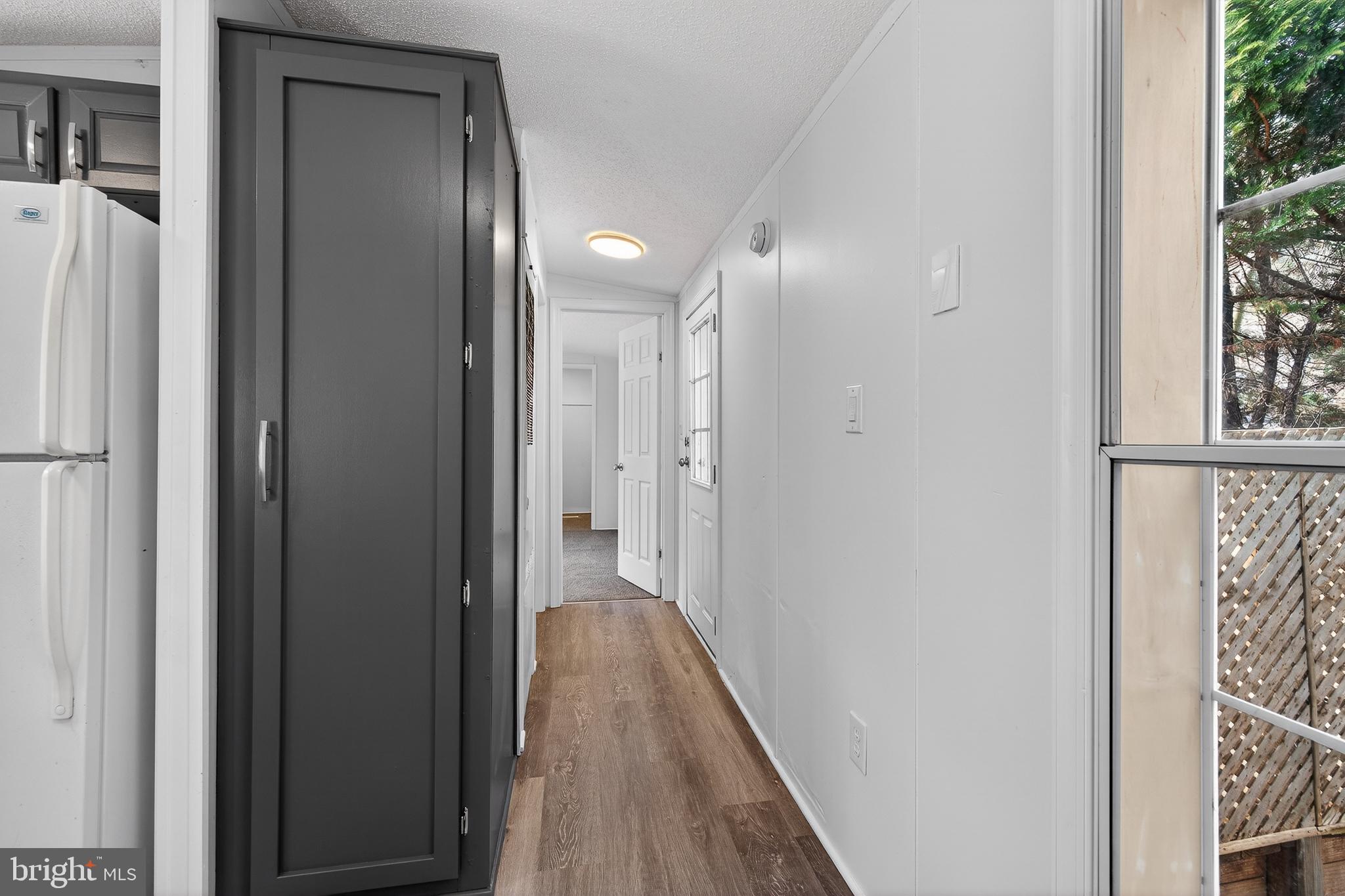 126 Boxwood Road, Unit 126 Middletown, DE 19709 - Photo 19 of 33 Bright and inviting hallway retreat.