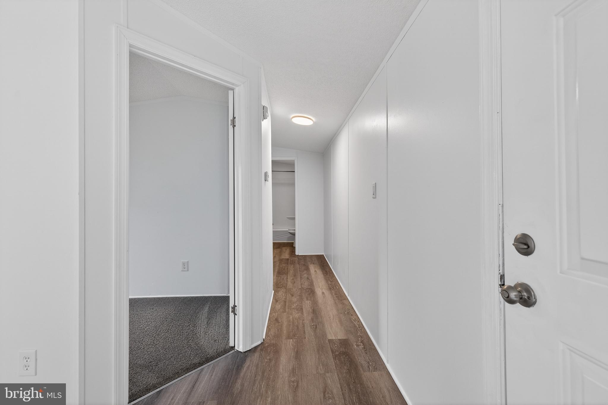 126 Boxwood Road, Unit 126 Middletown, DE 19709 - Photo 21 of 33 Bright and inviting hallway space.